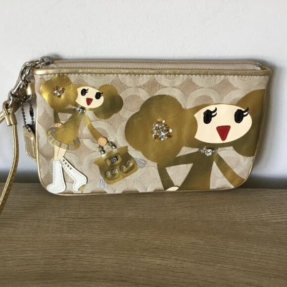 Coach Poppy Chan Goldy Wristlet in the Special Edition Poppy Chan Collection - Picture 1 of 9